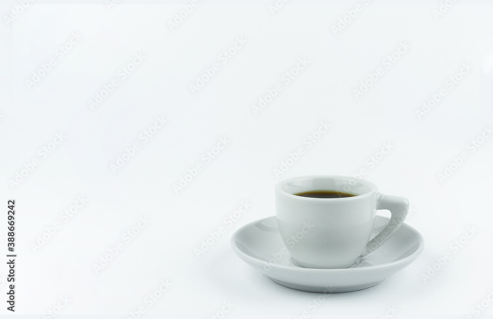 White Cup on a saucer with coffee on a white background White Cup on a saucer with coffee on a white background