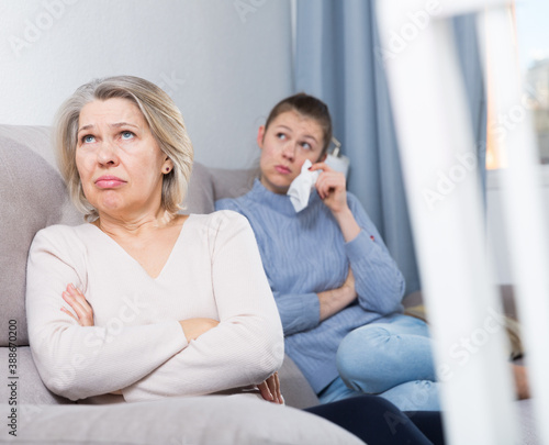 Mature woman and her adult daughter offended at each other after quarrel