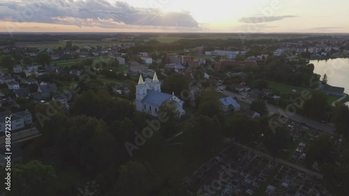 St. Archangel Michael Church in Sirvintos at Sunset. Aerial Arc Left photo