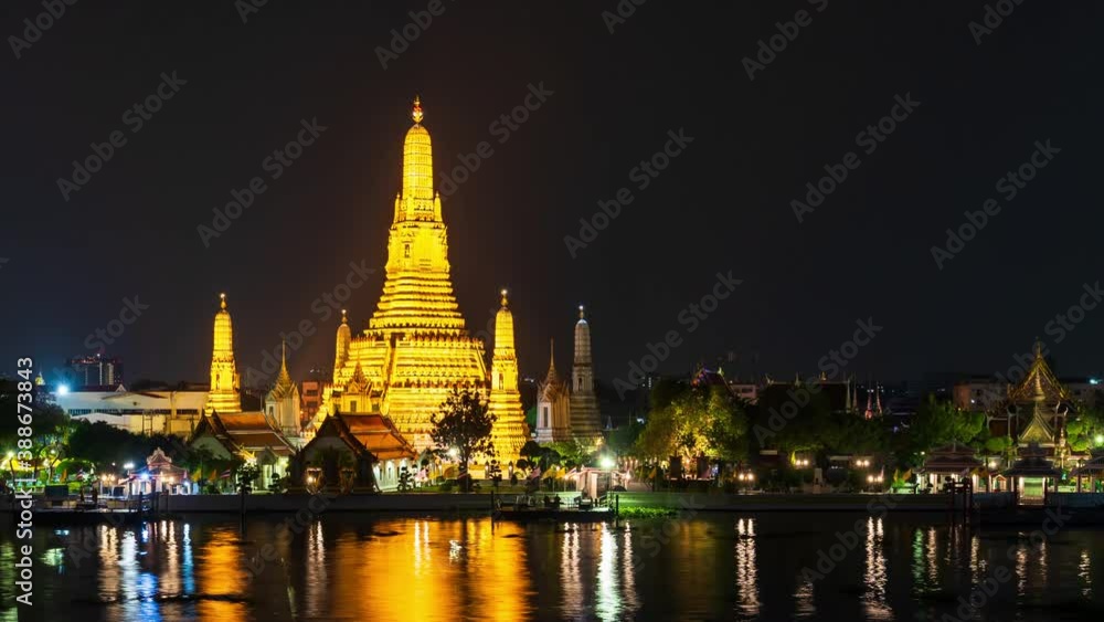 time lapse of Wat Arun Temple with Chao Phraya river at night in Bangkok, Thailand time lapse of Wat Arun Temple with Chao Phraya river at night in Bangkok, Thailand