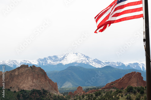 american flag in the mountains
