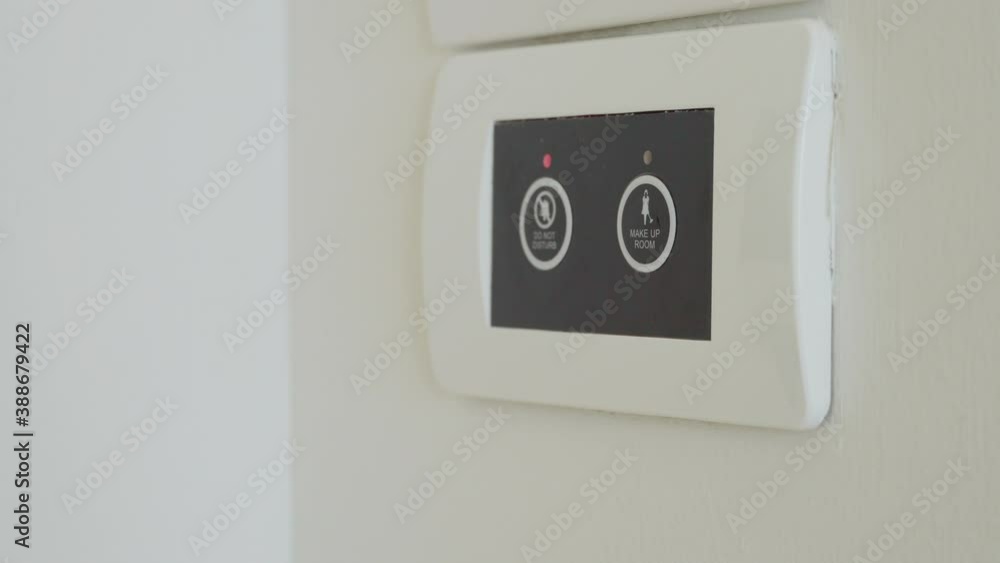 4K Video close up hand push do not disturb button in hotel room. Theme for relaxing in vacation time. 4K Video close up hand push do not disturb button in hotel room. Theme for relaxing in vacation time.