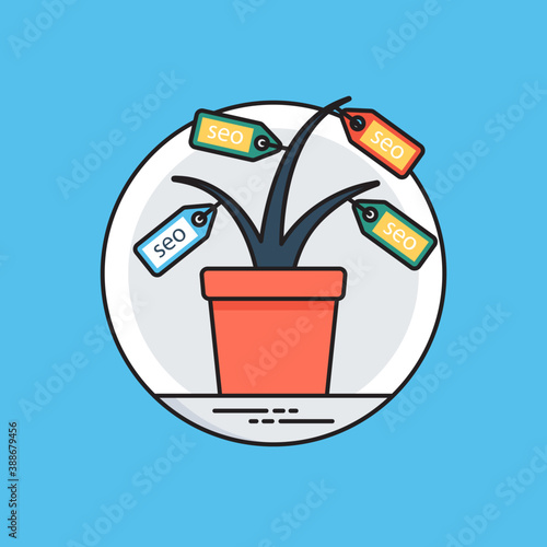 
A pot with tags on a plant showing seo tags concept
