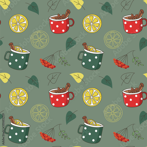 Vector seamless pattern with cups of tea with spices and lemons. Fall wallpaper.  Rowan and autumn leaves.  Texture for textile or wrapping paper.