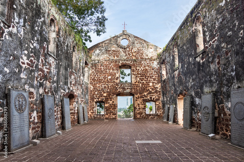 Portuguese hstoric ruins of Saint Paul Church with tombstone is Malacca popular tourist destination. No people. photo