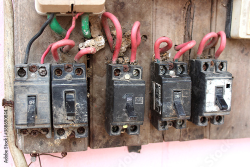 Old electric bridge Dangerous to use Old breaker The old and damaged light sign