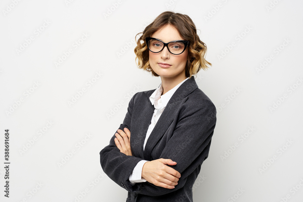 confident business woman in suit gesturing with hands work light background confident business woman in suit gesturing with hands work light background