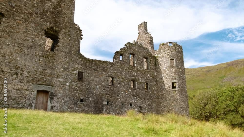 Walking towards Kilchurn Castle, a ruined structure located on the edge of Loch Awe, in Argyll and Bute, Scotland, UK Walking towards Kilchurn Castle, a ruined structure located on the edge of Loch Awe, in Argyll and Bute, Scotland, UK