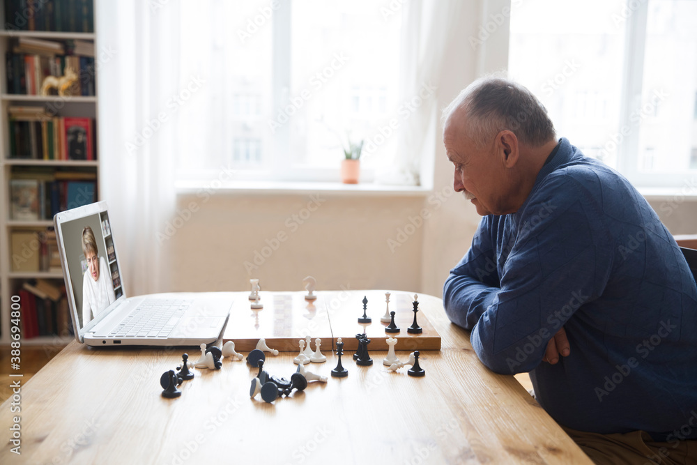 friends playing chess, Stock image