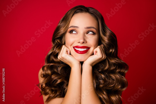 Closeup photo of attractive pretty ideal beauty wavy lady sensual appearance bright lipstick arms hold face chin look side empty space naked isolated vibrant bright red color background