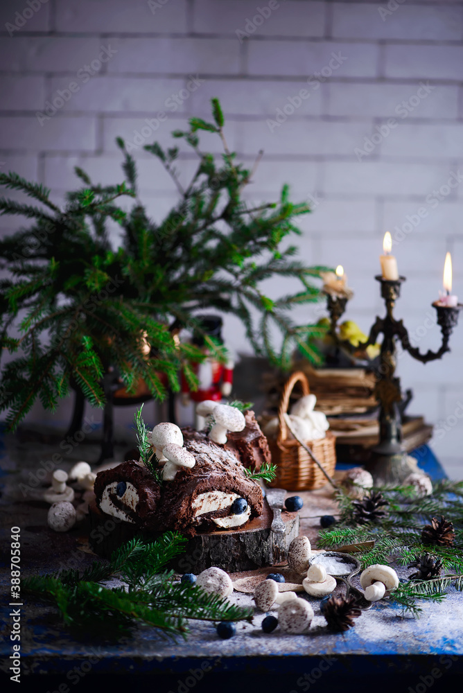 YULE LOG CAKE on a Christmas rustic background