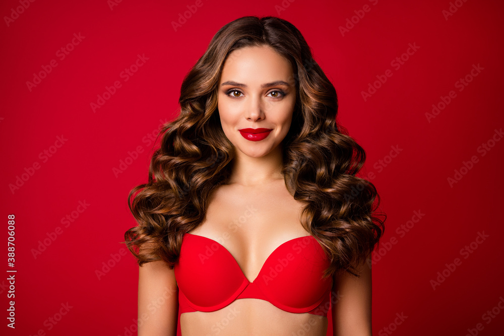 Photo of attractive seduce perfect beauty curly lady sensual appearance bright lipstick x-mas surprise boyfriend wear brassiere lingerie advertisement isolated vibrant red color background - obrazy, fototapety, plakaty 