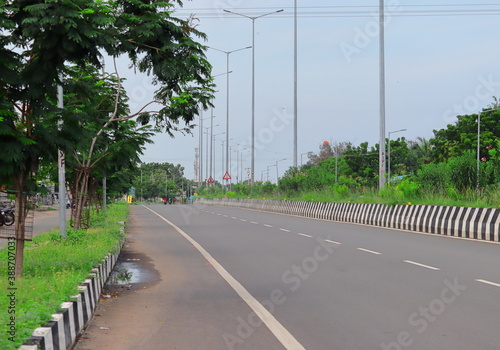 empty  highways on the asphalt under the  sky. travel concept.Rural curve  national way road among the green nature