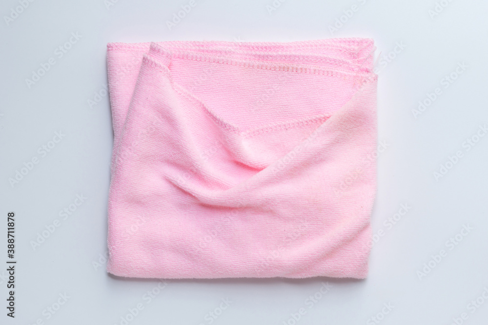 Pink microfiber cloth on white background.