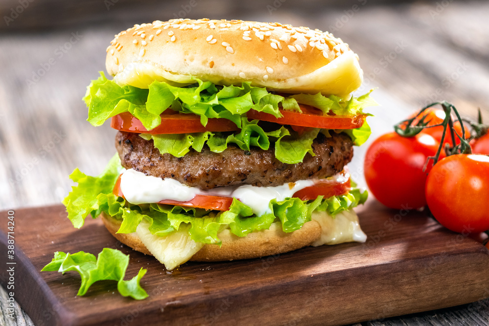 hamburger on a wooden background hamburger on a wooden background