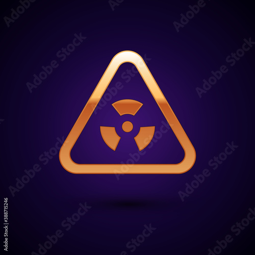 Gold Triangle sign with radiation symbol icon isolated on black background. Vector.