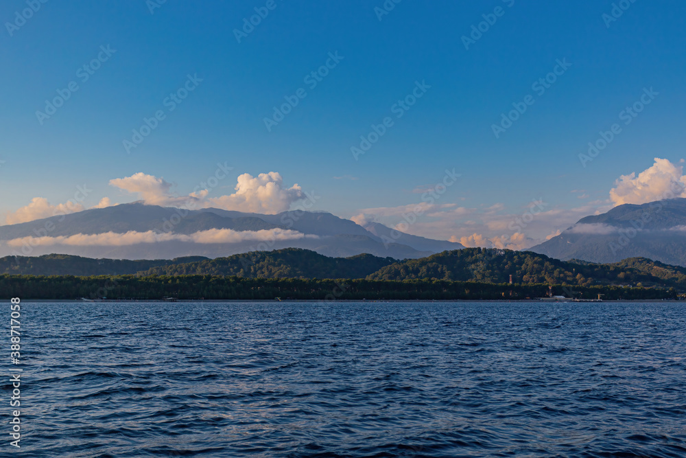 Seascape with a view of the beauty of the Caucasus mountains from the sea.