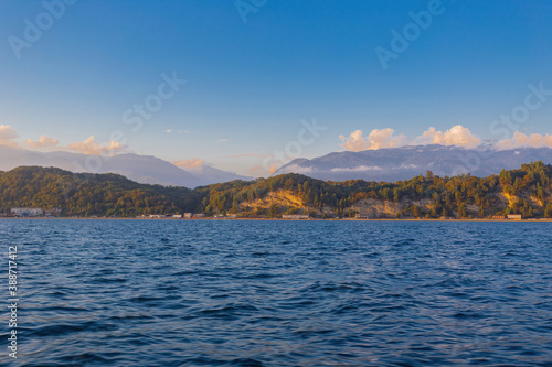 Marine landscape with views of the mountains with the blue sky.