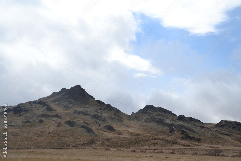 Hiking in the wild and dramatic nature of volanoes, snowy mountains, waterfalls, geysers and hot springs in Iceland Hiking in the wild and dramatic nature of volanoes, snowy mountains, waterfalls, geysers and hot springs in Iceland