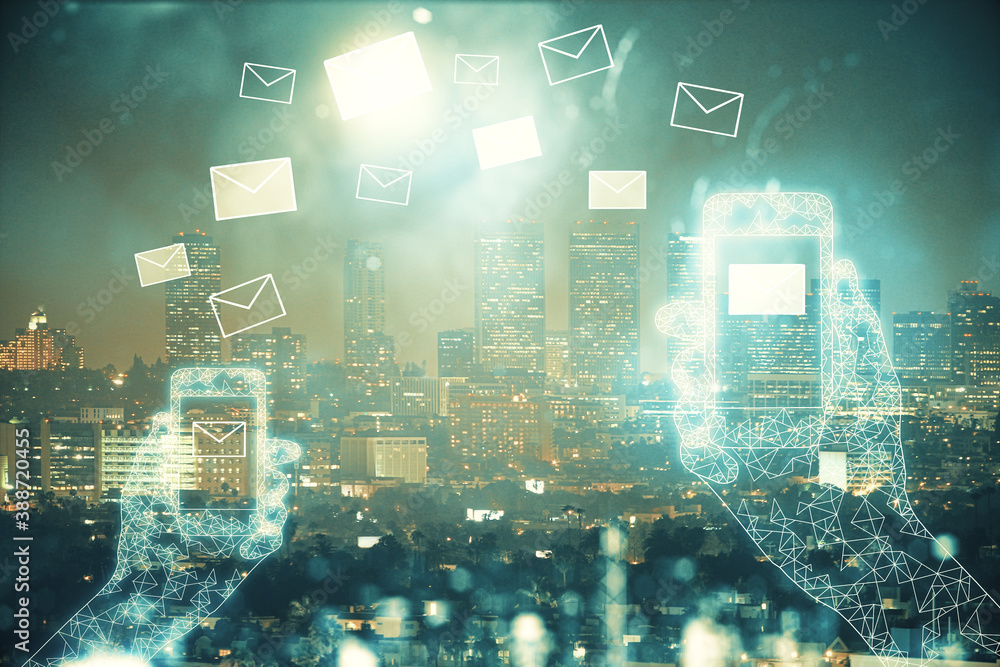 Obraz premium Double exposure of envelop hologram flying from gadget and city view background. Concept e-mail.