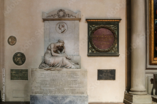 Tomb of Pompeo da Mulazzo Signorini and commemorative plaques of Leonardo da Vinci, Enrico Fermi and Antonio Meucci in the Basilica di Santa Croce (Basilica of the Holy Cross) in Florence, Italy.  photo