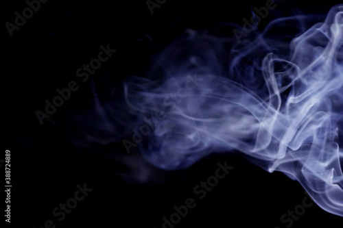 abstract light blue realistic smoke fog overlay refraction texture natural on black.
