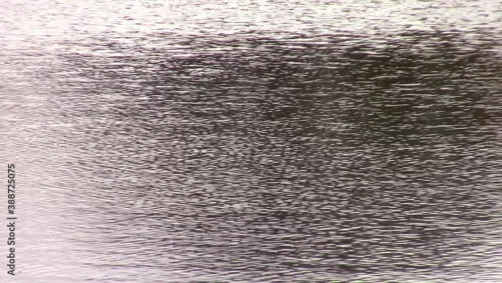 Water ripples on a lake reflecting the sky for natural abstract background. Water ripples on a lake reflecting the sky for natural abstract background.