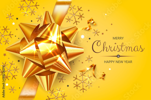 Horizontal banner with gold Christmas symbols and text. Christmas gift, bow, serpentine and snowflakes on yellow background.
