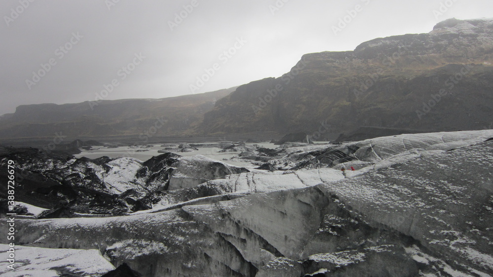 The dramatic Icelandic landscapes with volcanoes, snow, geysers, waterfalls and hot springs The dramatic Icelandic landscapes with volcanoes, snow, geysers, waterfalls and hot springs