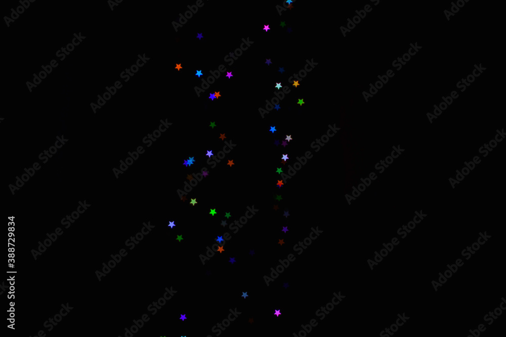 light colorful blue star little effect isolated overlay glitter texture on black.