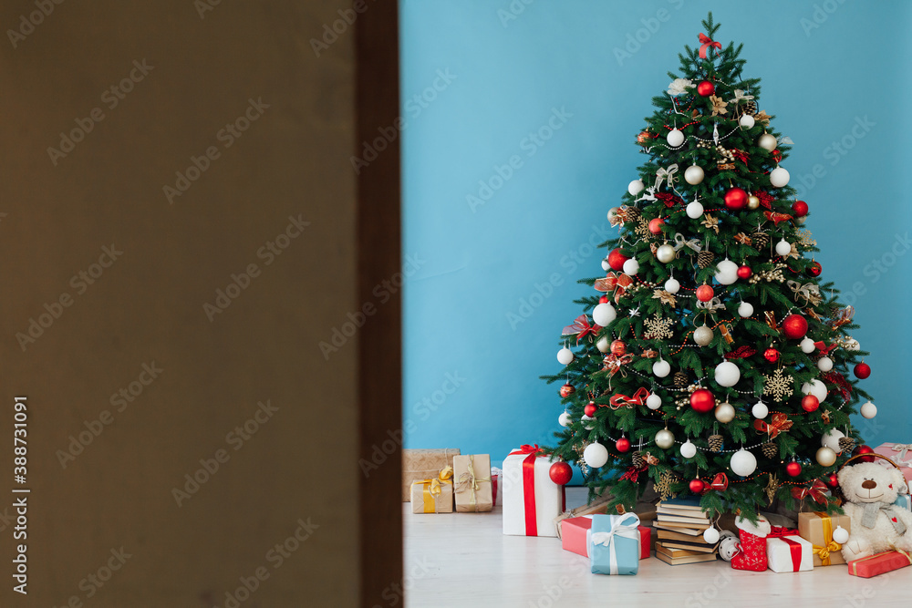 Christmas tree with gifts blue decor new year interior