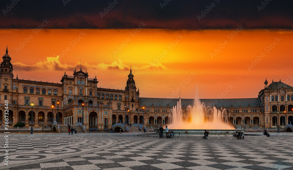 Fototapeta premium Spanish plaza sunset with fountain in Seville