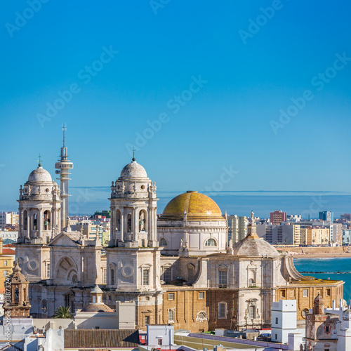 Cadiz Cathedral under clear blue sky for text space