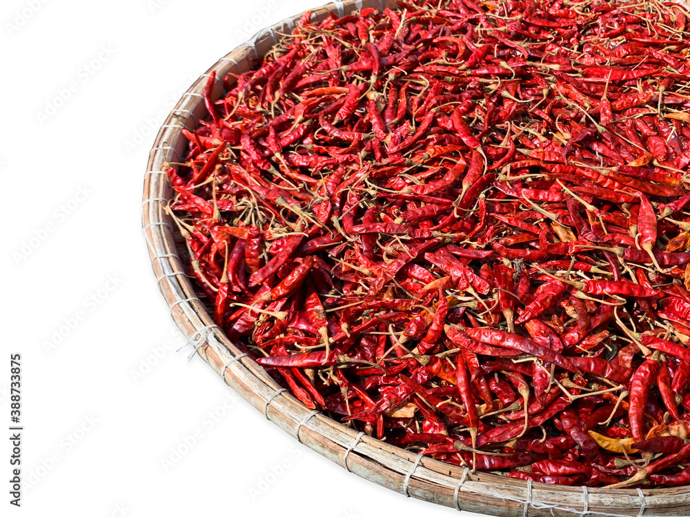 Fototapeta premium Dried red Chili on Bamboo Rack isolated on white background
