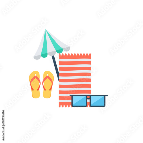 
Summer props on a seashore with umbrella depicting beach 
