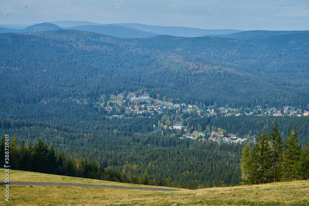 Naklejka premium Panorama of Krkonose mountains and Harrachov from Certova Hora