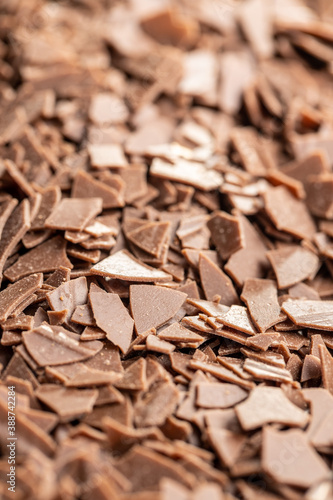 Grated dark chocolate. Chocolate flakes background.