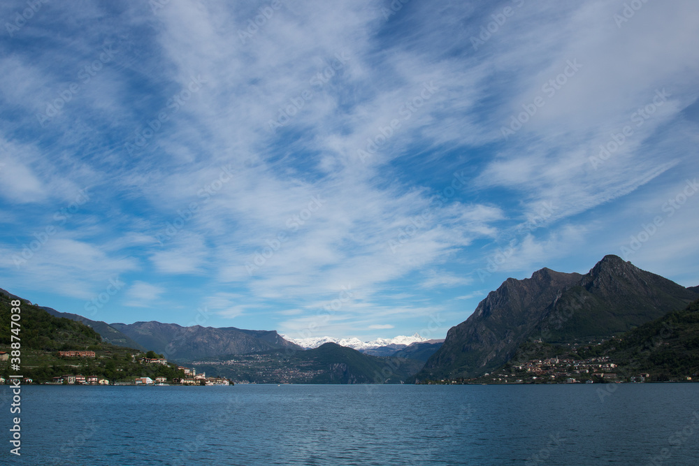 Panoramic view.
Panoramic view of portion of Iseo Lake, with clouds in sky, Lombardia.