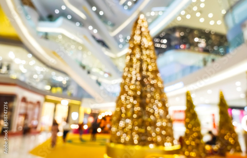 Photography Blurred of  light celebration on christmas tree in mall and festive bokeh lighti