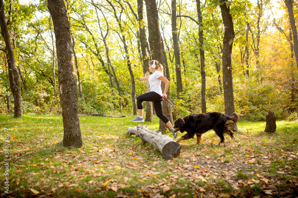 Action. Disabled woman walking down and training outdoors in forest, practicing. Active woman with handicap. Concept of healthy lifestyle, motivation, concentration, inclusion and diversity. Action. Disabled woman walking down and training outdoors in forest, practicing. Active woman with handicap. Concept of healthy lifestyle, motivation, concentration, inclusion and diversity.
