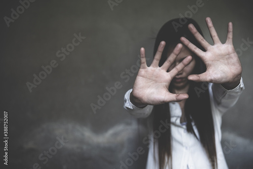 Fotografie Woman hand sign for stop abusing violence,  human trafficking, stop violence against women, Human is not a product