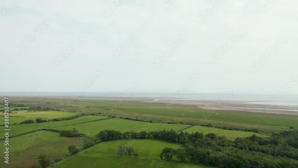 Aerial Landscape View of the Skyline over a Vast Sand and Grassland Aerial Landscape View of the Skyline over a Vast Sand and Grassland