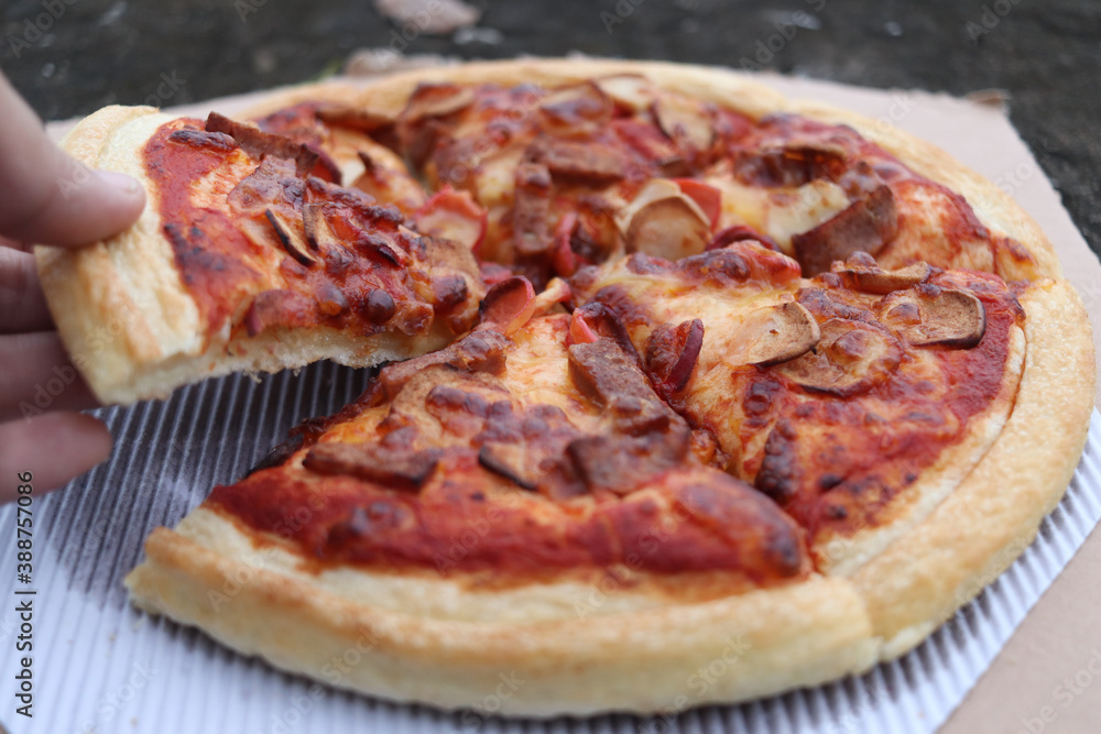Tasty delicious pepperoni pizza, top view. Ready to eat Tasty delicious pepperoni pizza, top view. Ready to eat