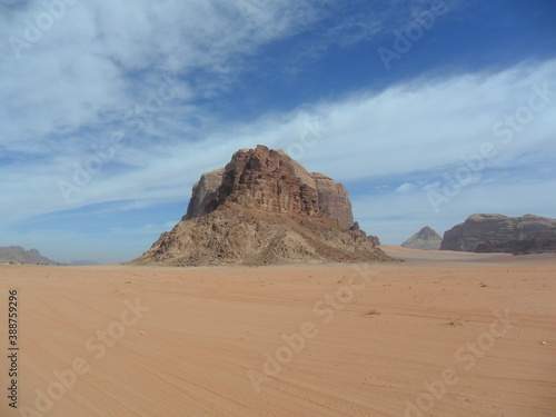 Hiking in the red desert sandcliffs and dunes of Wadi Rum in Jordan  Middle East