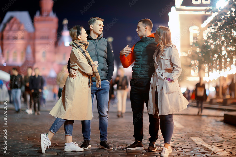 red square evening winter, a group of friends for a walk new year christmas moscow russia red square evening winter, a group of friends for a walk new year christmas moscow russia