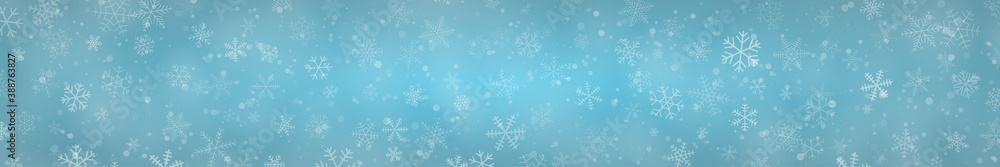 Christmas banner of snowflakes of different shapes, sizes and transparency on light blue background Christmas banner of snowflakes of different shapes, sizes and transparency on light blue background