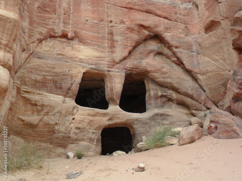 Exploring the archeological site of Petra and the red sandstone landscapes in Jordan photo