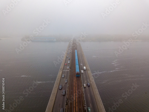 Aerial drone view. Kiev metro bridge in dense fog. © Sergey
