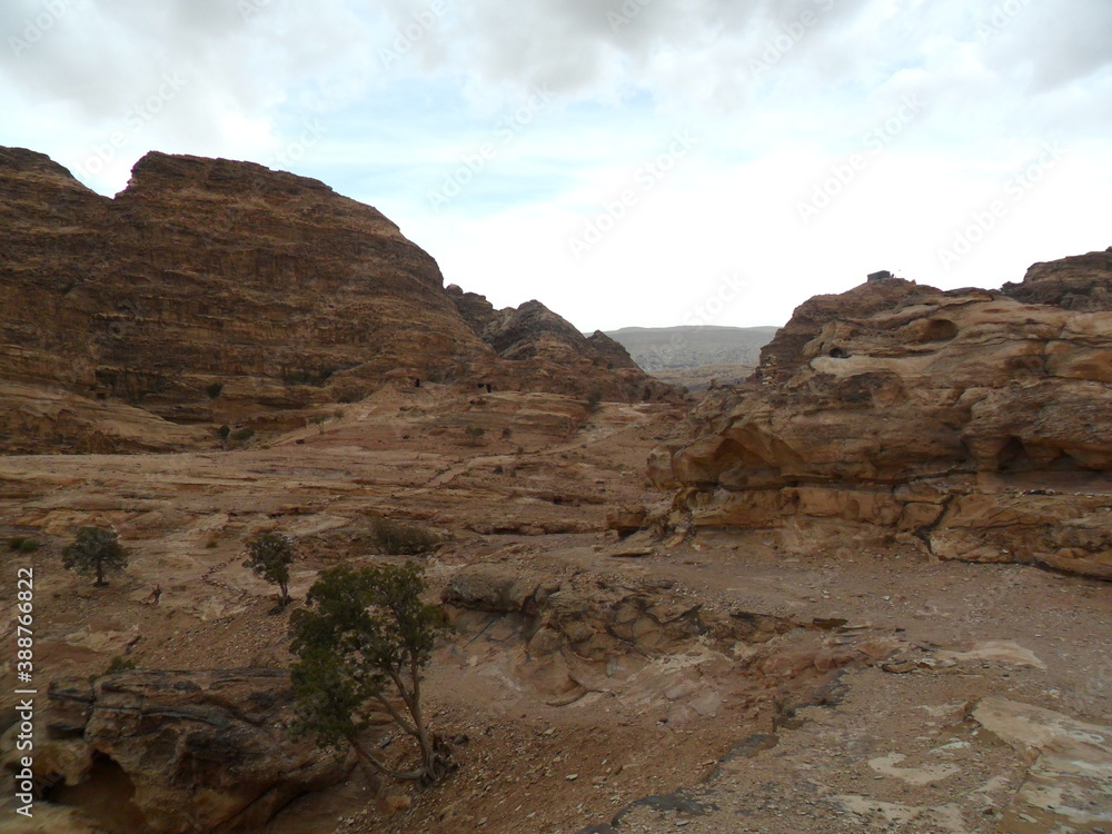 Exploring the archeological site of Petra and the red sandstone landscapes in Jordan