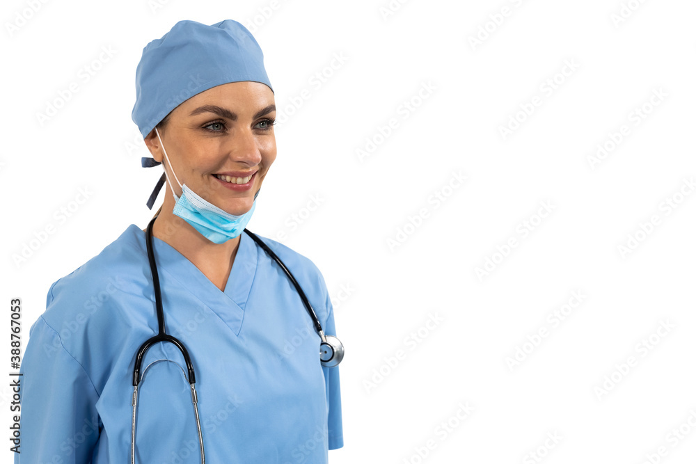 Female surgeon smiling against white background Female surgeon smiling against white background